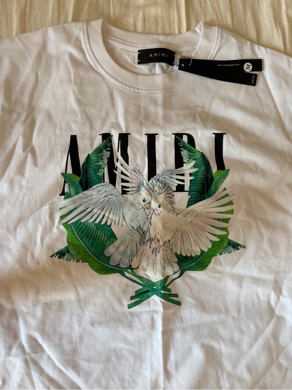 AMIRI White Tee with Green Leaf and White Bird Motif